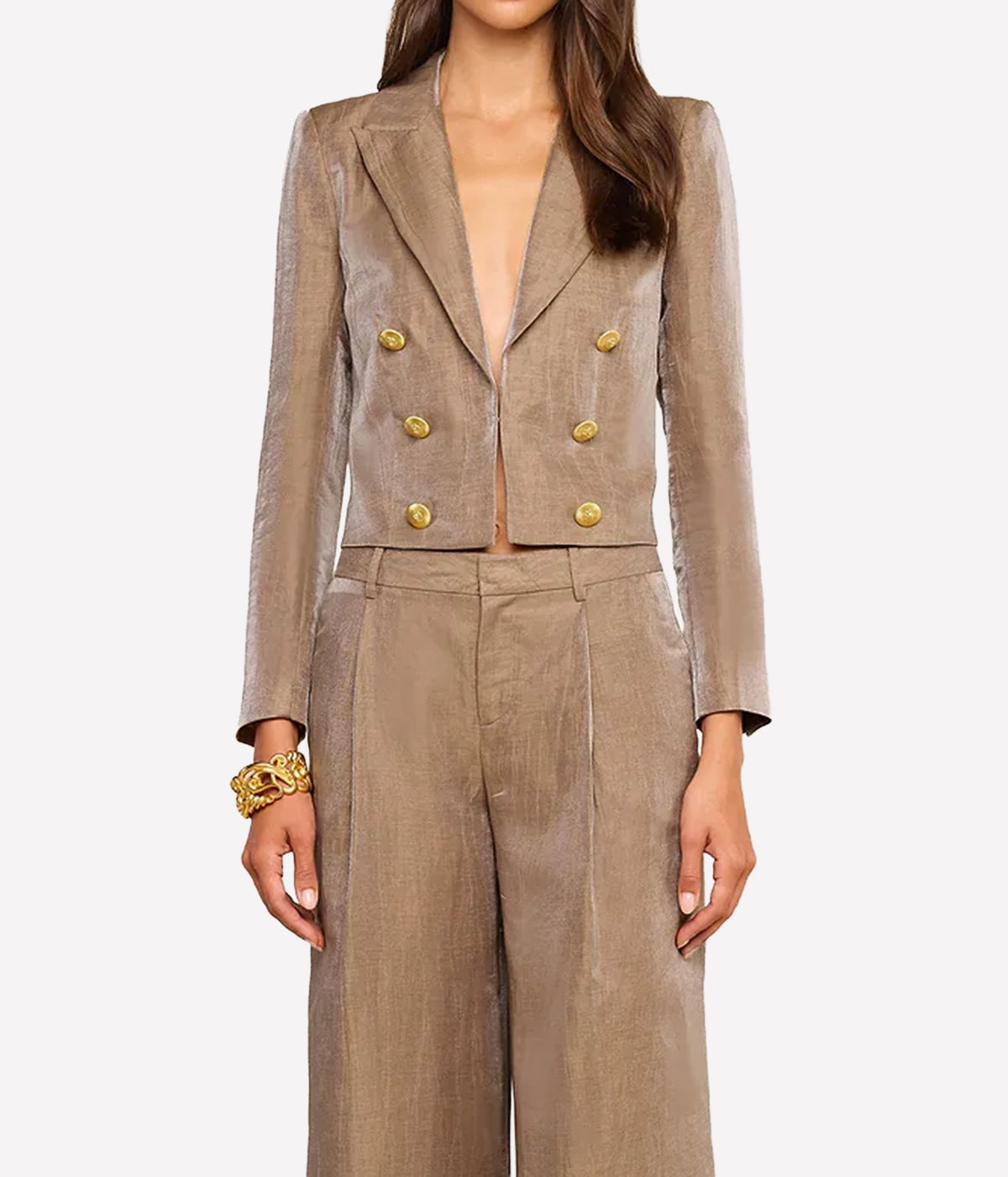 Model wearing the L’AGENCE Inez Cropped Blazer in Latte & Gold with decorative gold buttons and matching Allanah wide-leg trousers.