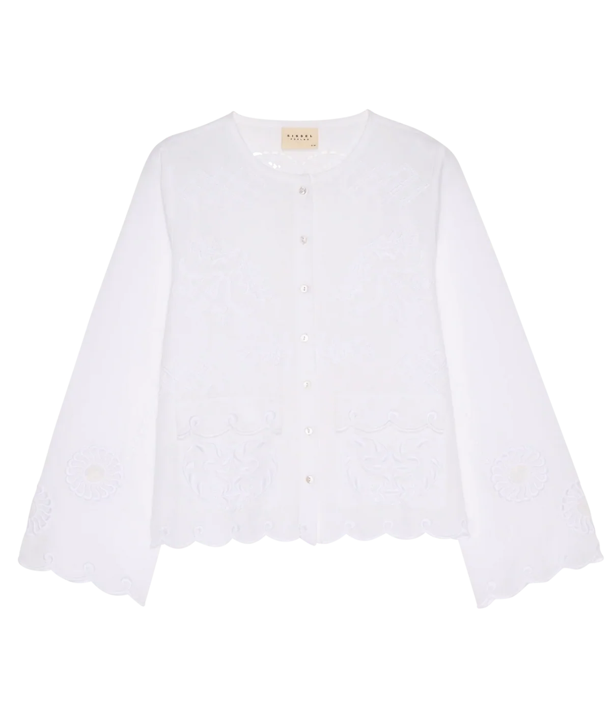 Sissel Edelbo Ester Shirt in Ecru laid flat from the front, showing the round collar, mother-of-pearl buttons, wide sleeves, scalloped hem and tonal embroidery and cutwork details