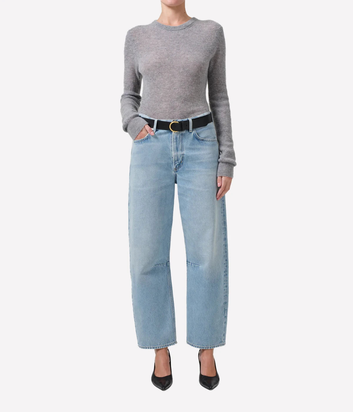 ALT Text: Light indigo tapered barrel-leg jeans with subtle fading, rigid cotton fabric, and a relaxed fit through the top block.