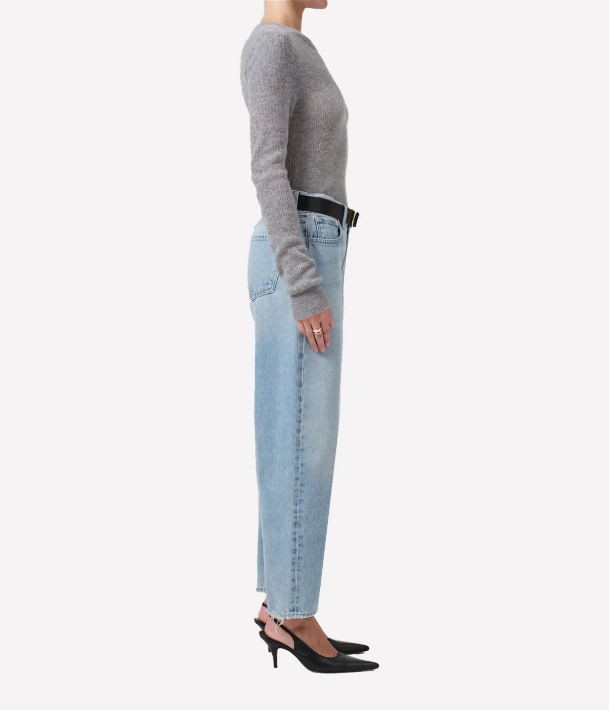 ALT Text: Light indigo tapered barrel-leg jeans with subtle fading, rigid cotton fabric, and a relaxed fit through the top block.