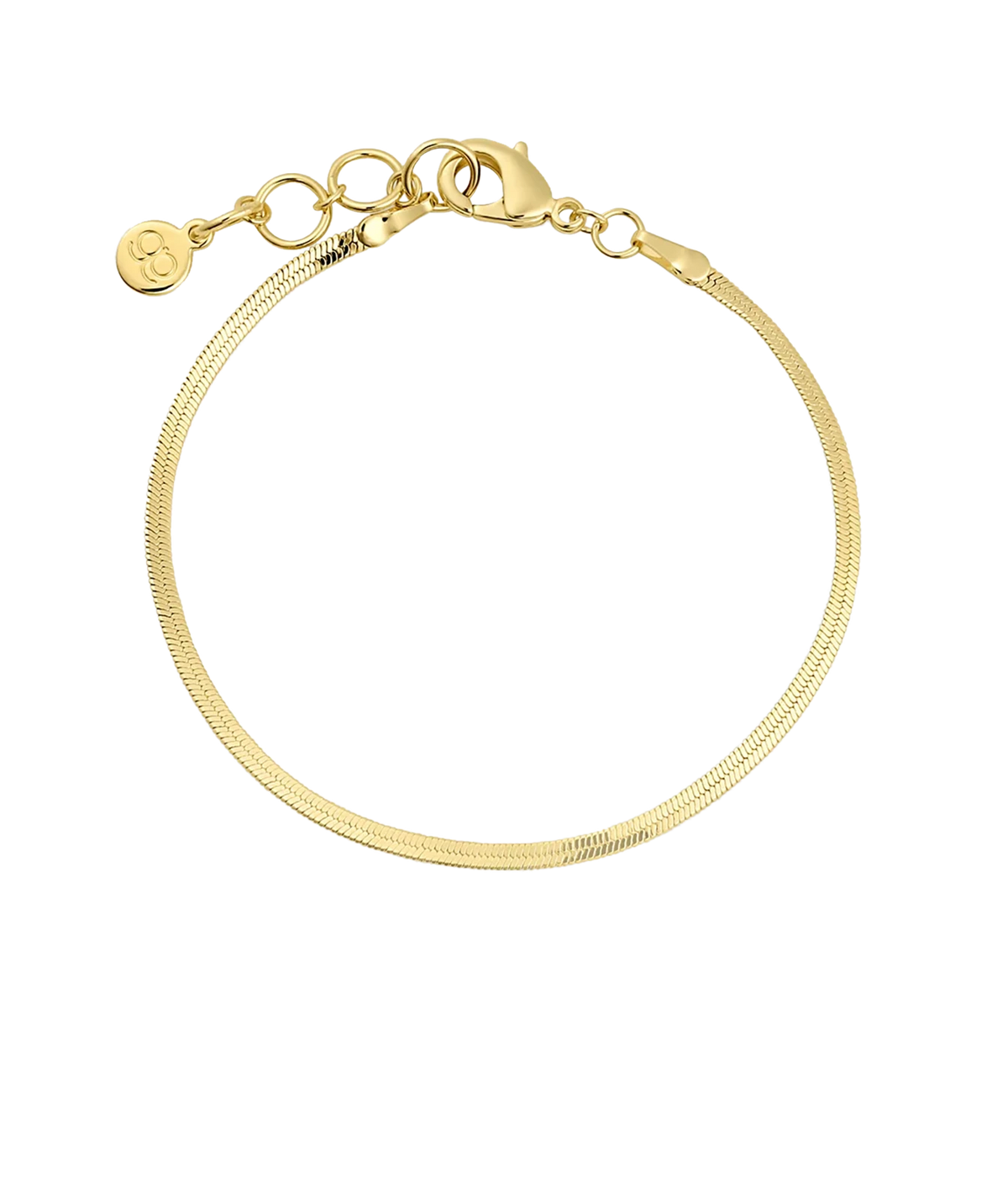 Gorjana Venice Mini Bracelet in Yellow Gold laid flat from a side angle, showing the smooth flat chain and the clasp with extender