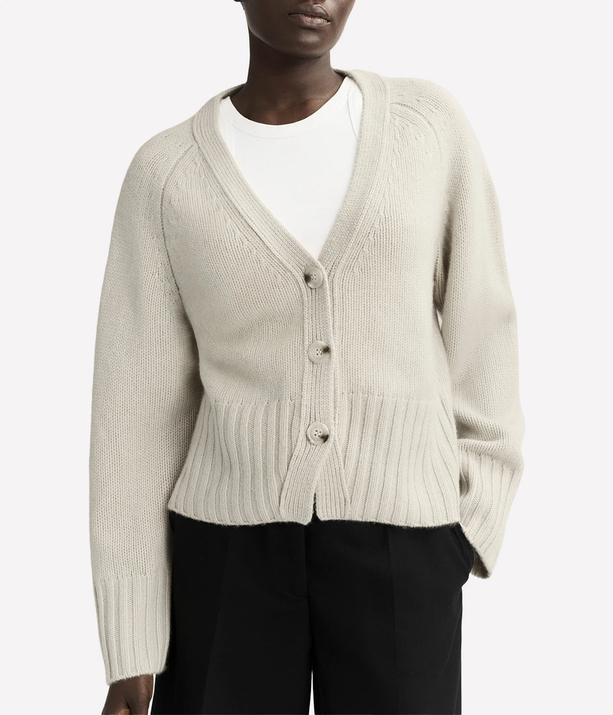 Chunky knit v-neck cashmere cardigan by Soft Goat in a relaxed fit with button-down front – luxury women’s knitwear.