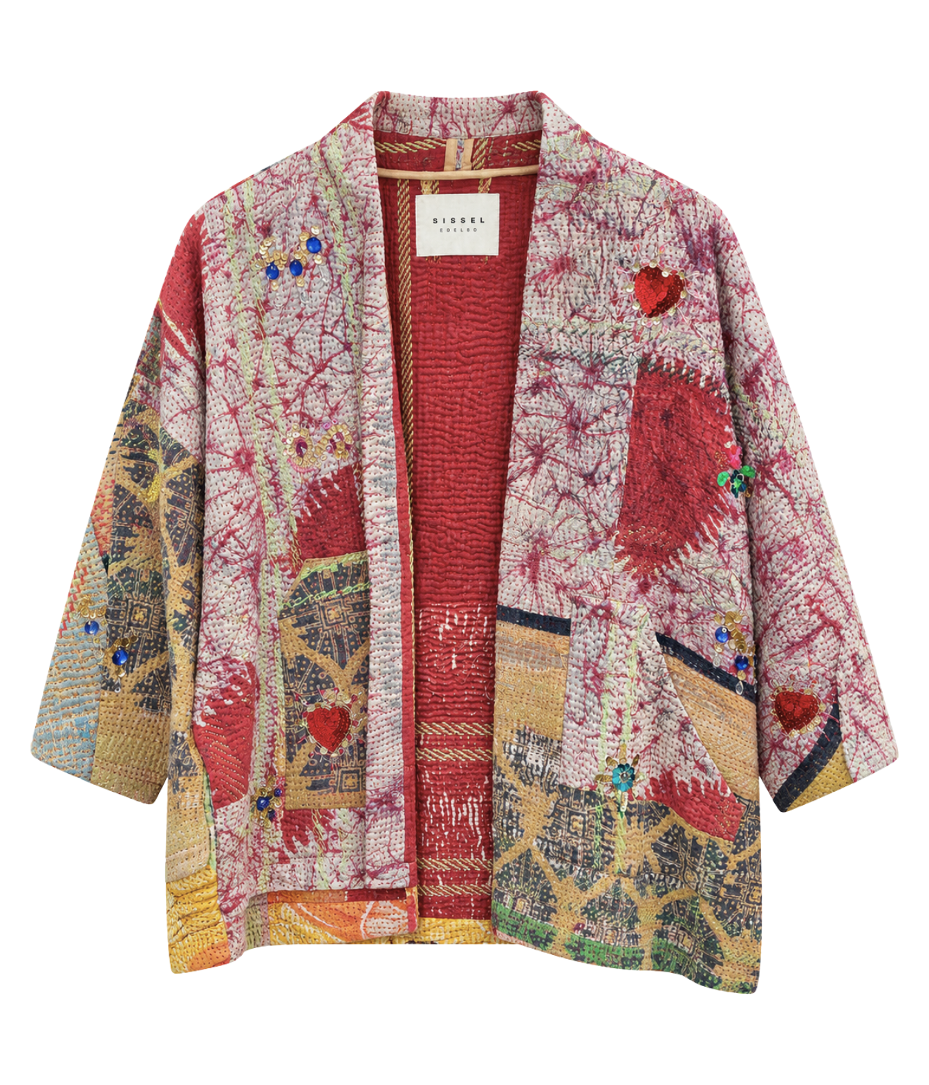 A colorful open-front cardigan jacket by Klerkel, featuring a textured abstract patchwork design with red, pink, yellow, green, and blue elements, displayed on a clean white background.