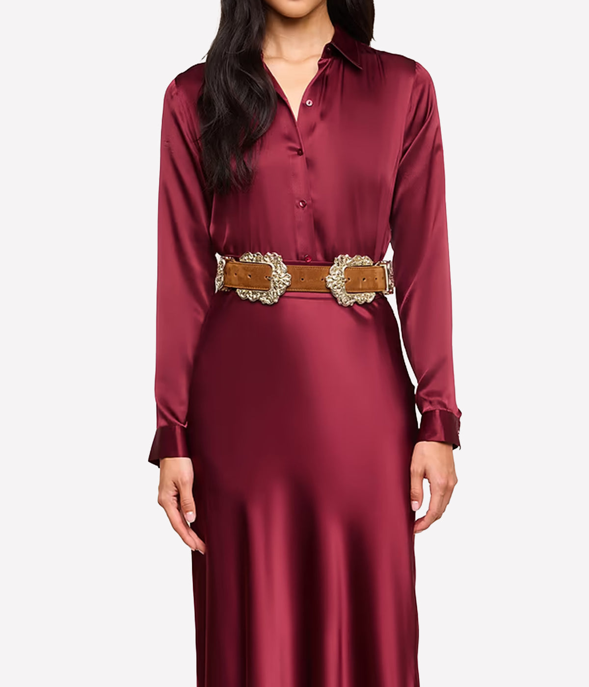 Front on image of a woman wearing the Tyler L/S Blouse in Merlot Red with a wide brown belt and matching silk red skirt