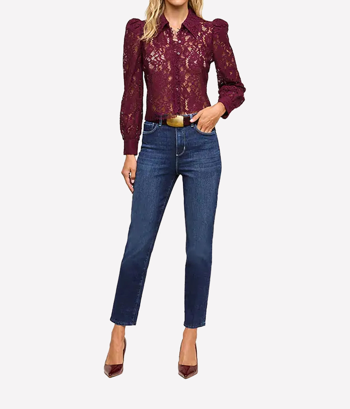L'Agence Anita Lace Blouse In Deep Sangria - model wearing red lace blouse and blue denim jeans