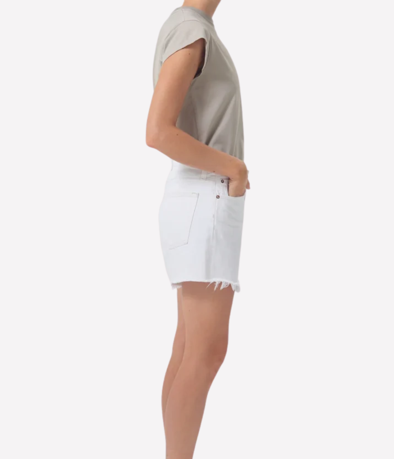 AGOLDE Parker Long Shorts in Panna Cotta wash, featuring a high-rise fit, relaxed silhouette, and frayed hem.
