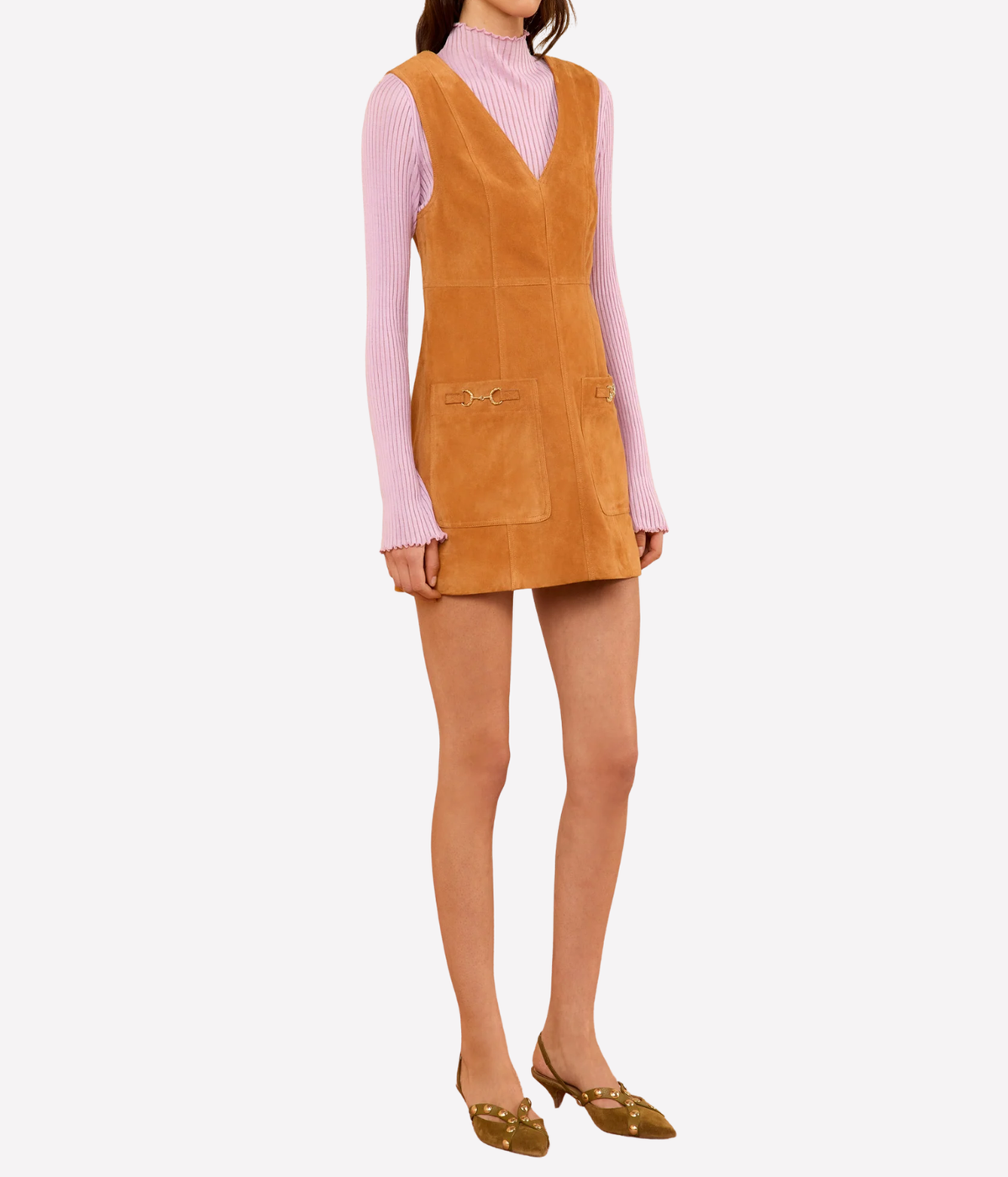 Ulla Johnson Sloane Suede Mini Dress in Cognac brown, full-length outfit view styled with a pink knit and pointed-toe flats.