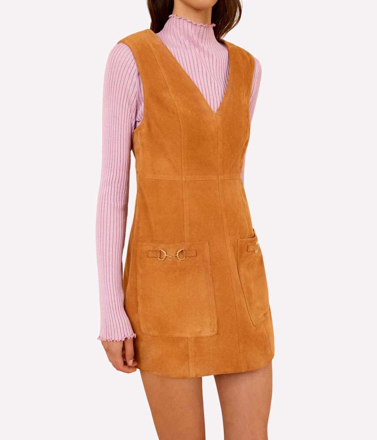 Ulla Johnson Sloane Suede Mini Dress in Cognac brown, angled front view showing suede panelling and gold-tone pocket hardware.