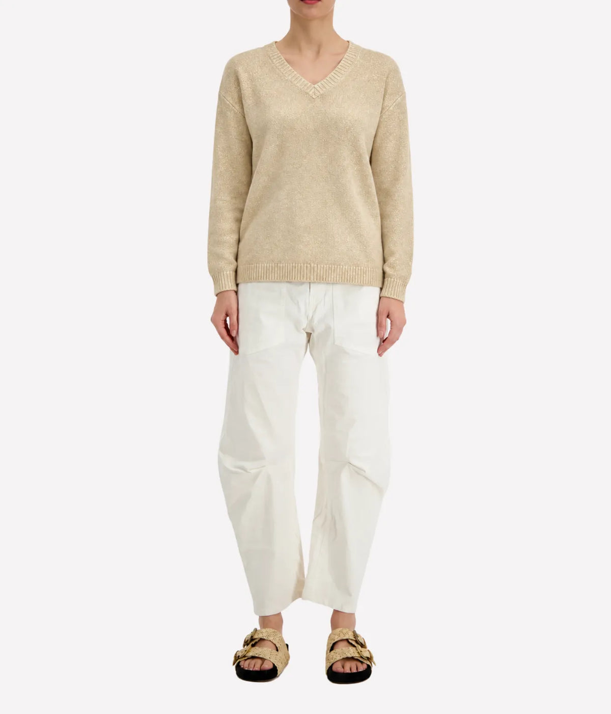 Model wearing the Avant Toi V Neck Knitted Pullover in Burro, showing the V neckline and relaxed fit