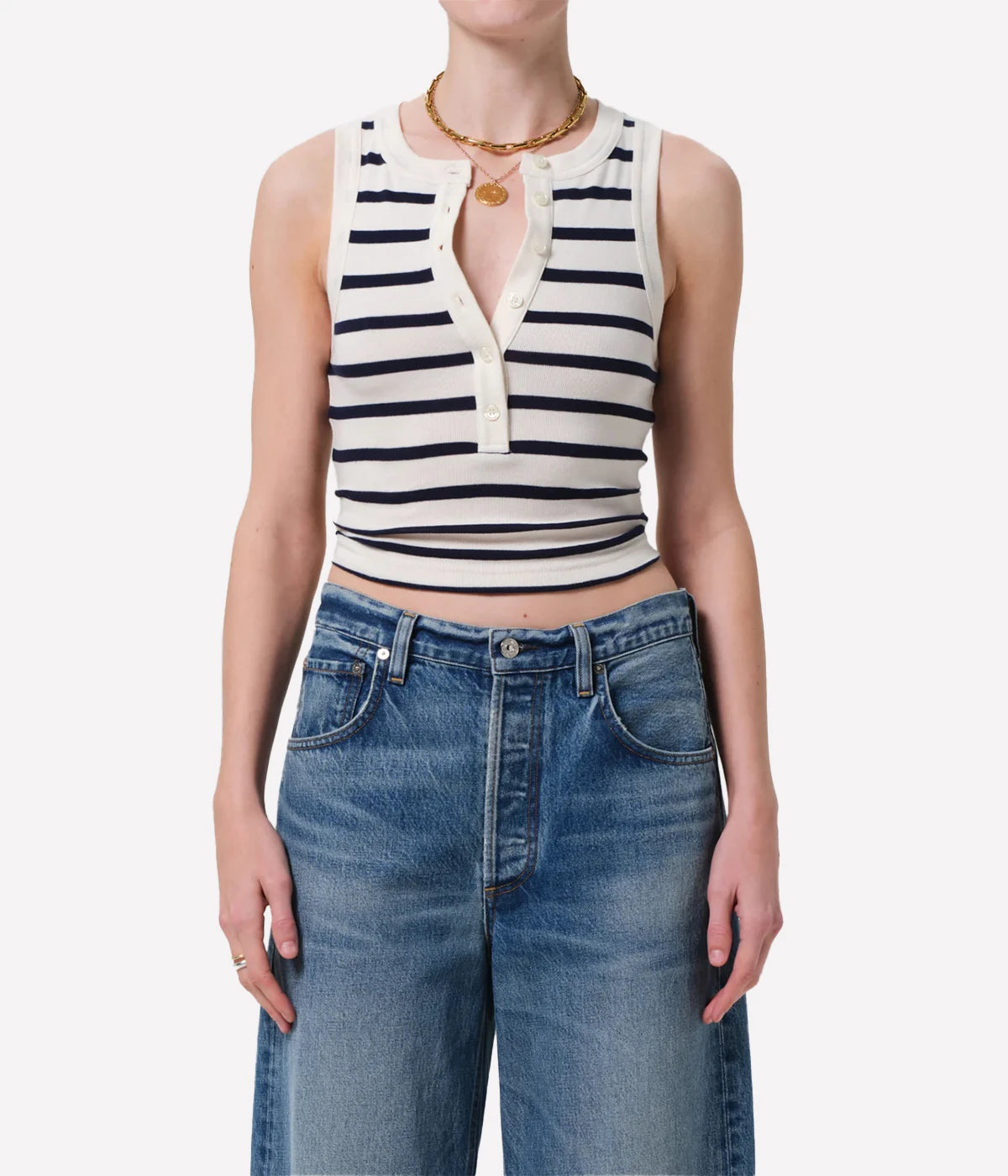 ALT text: Cream and navy striped button-front sleeveless tank.