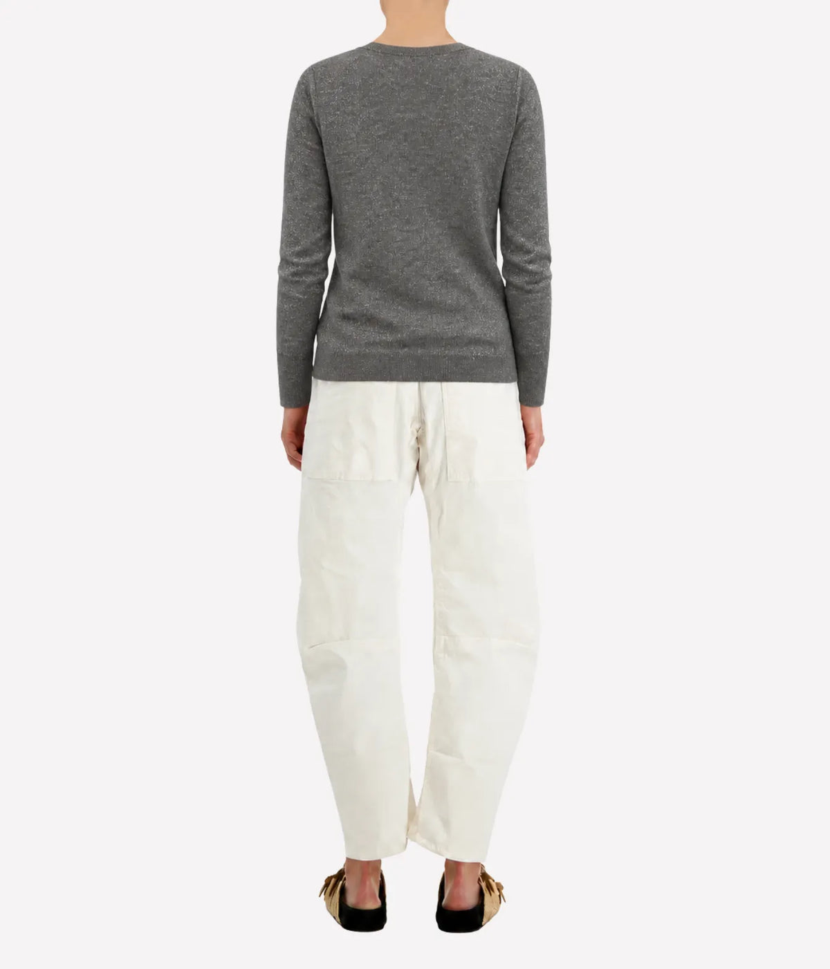 Model wearing the Avant Toi Knitted Pullover in Fango, showing the ribbed cuffs and hem
