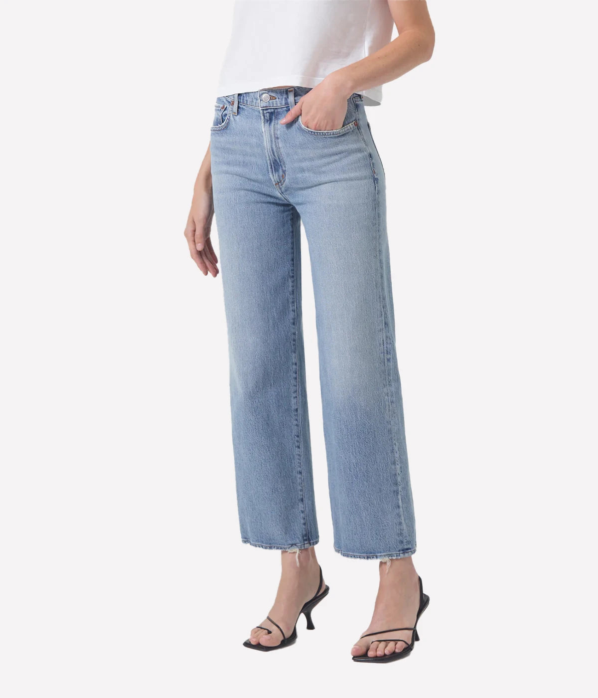 ALT Text: Relaxed mid-rise Harper Jean in light indigo with a cropped wide leg, subtle fading, and finished hems for a chic, casual style.