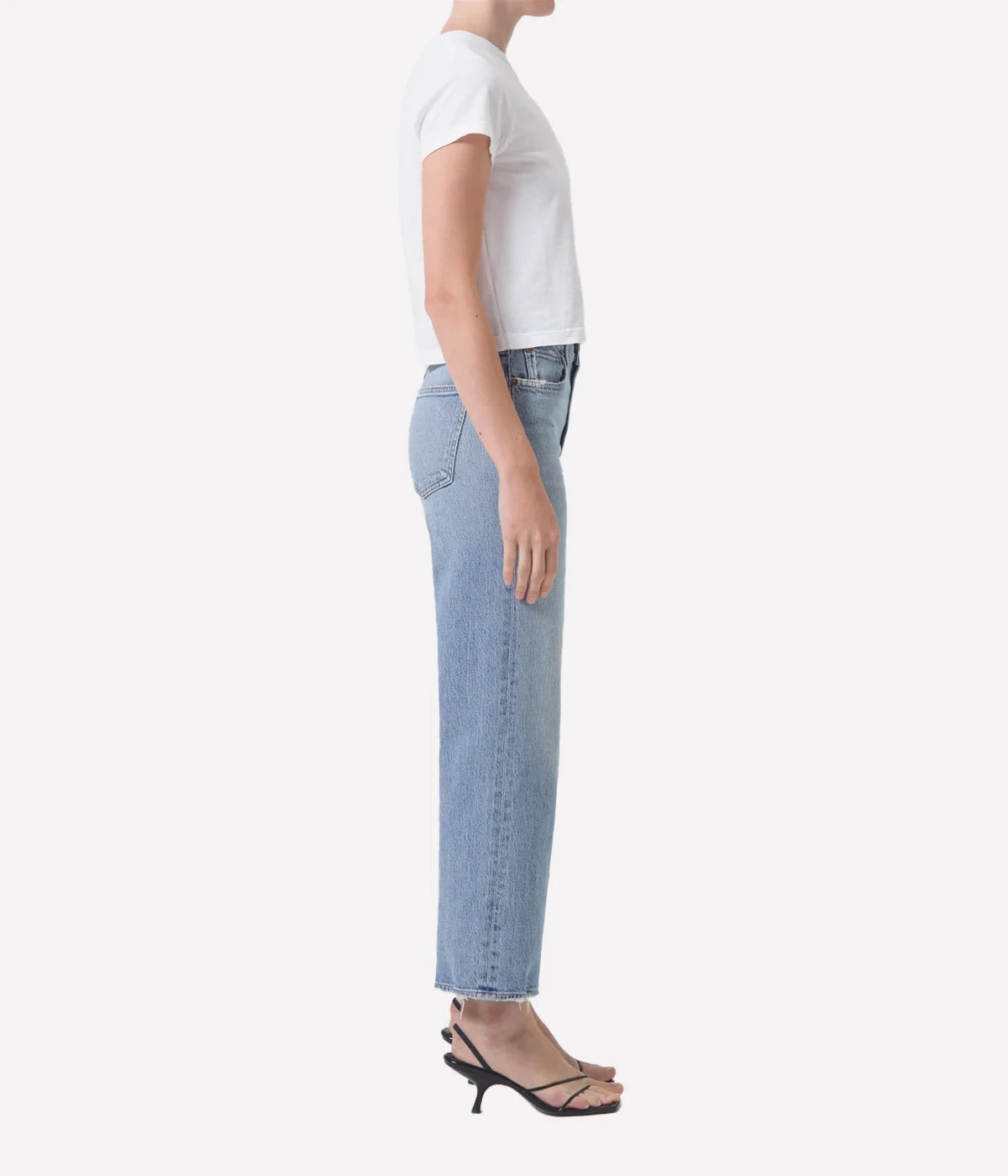 ALT Text: Relaxed mid-rise Harper Jean in light indigo with a cropped wide leg, subtle fading, and finished hems for a chic, casual style.