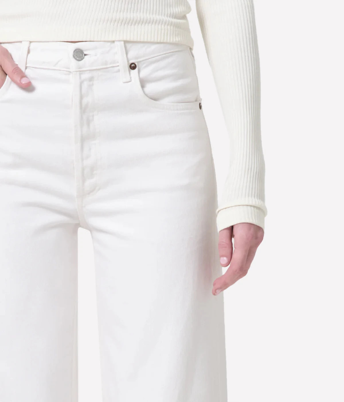 ALT Text: Ren Jean in eggshell warm white with a high-rise waist, relaxed fit through the hips, and wide-leg silhouette, made from 100% organic cotton for chic all-day comfort.