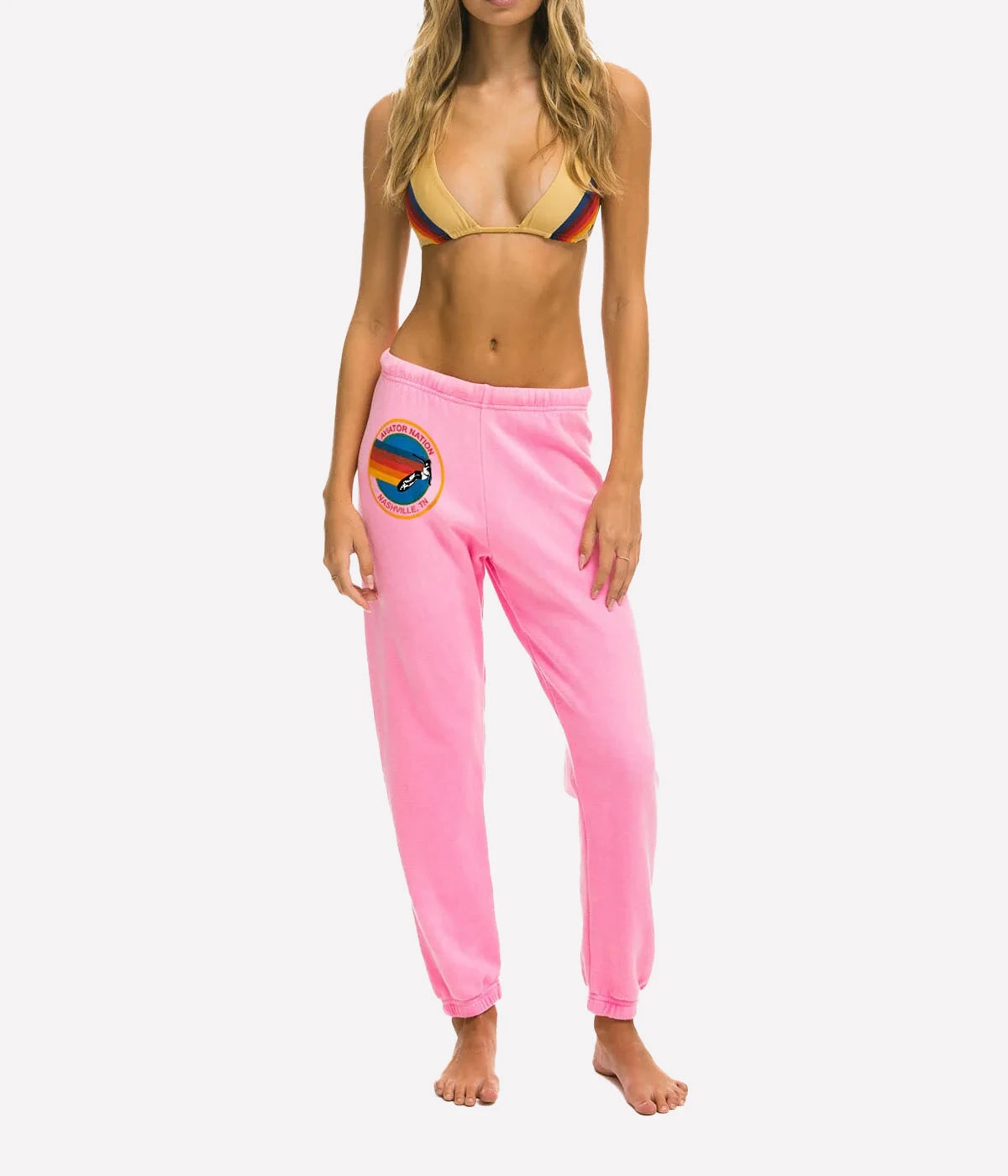 Ultra-soft sweatpants with unique stitching detail, shown in a casual lounge setting.