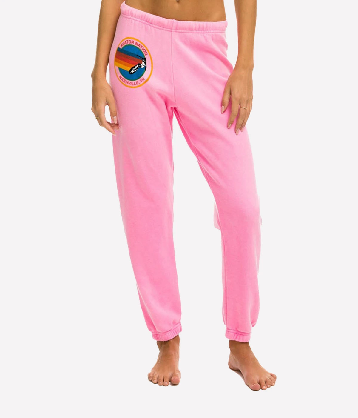 Ultra-soft sweatpants with unique stitching detail, shown in a casual lounge setting.