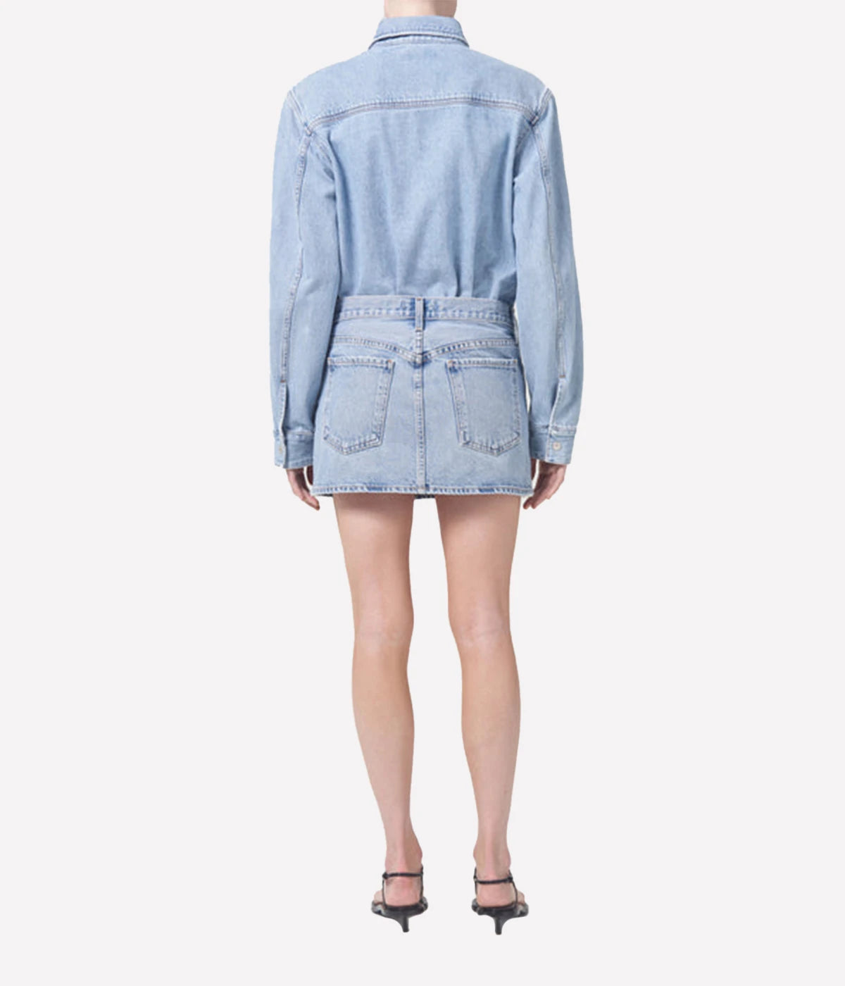 The Alek Mini Skirt in organic cotton, featuring a zipper fly and a chic, casual silhouette