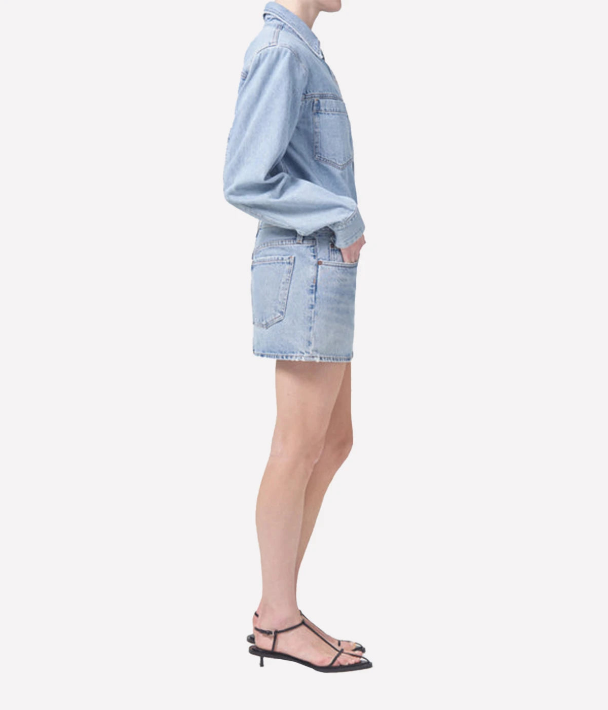 The Alek Mini Skirt in organic cotton, featuring a zipper fly and a chic, casual silhouette