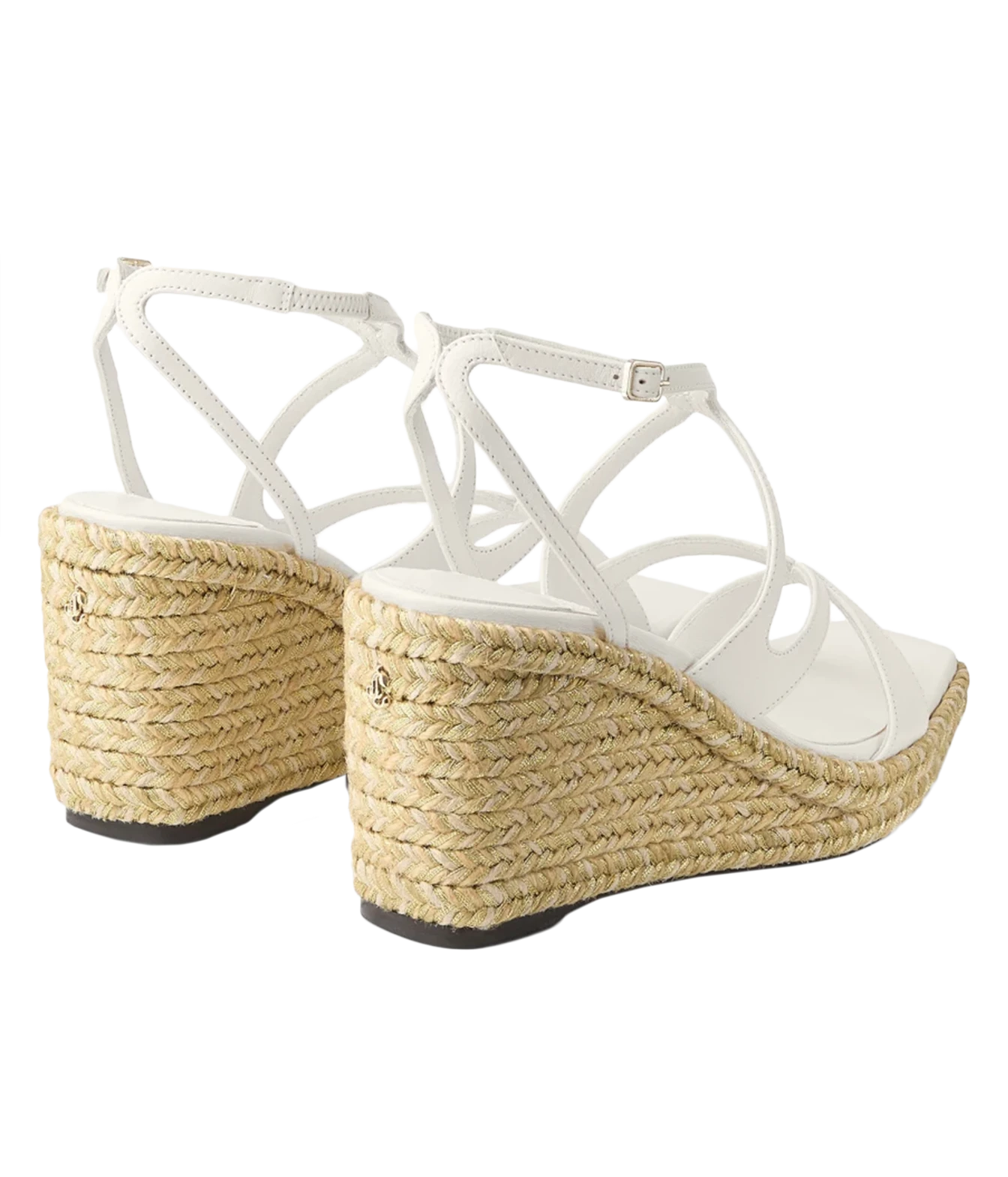 White strappy wedge sandals with woven jute espadrille-style heels, shown from a side-rear angle on a white background.