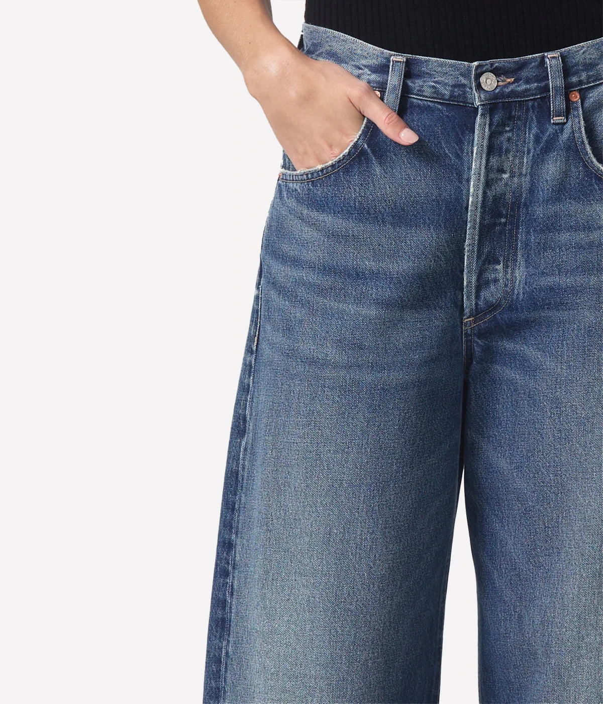 Relaxed-fit Ayla Jeans with a cuffed leg, styled with an oversized blazer and boots for a chic, vintage-inspired look.