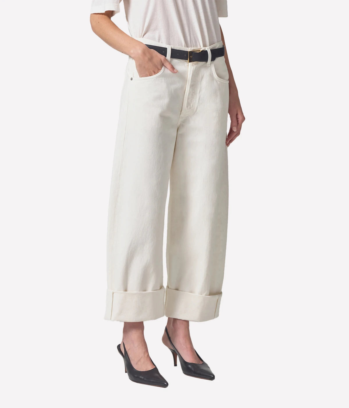 Tumble dry low.
ALT Text: Citizen of Humanity Ayla Jean in 100% cotton, featuring a reworked vintage silhouette with a relaxed top block and roomy cuffed leg for versatile styling options.