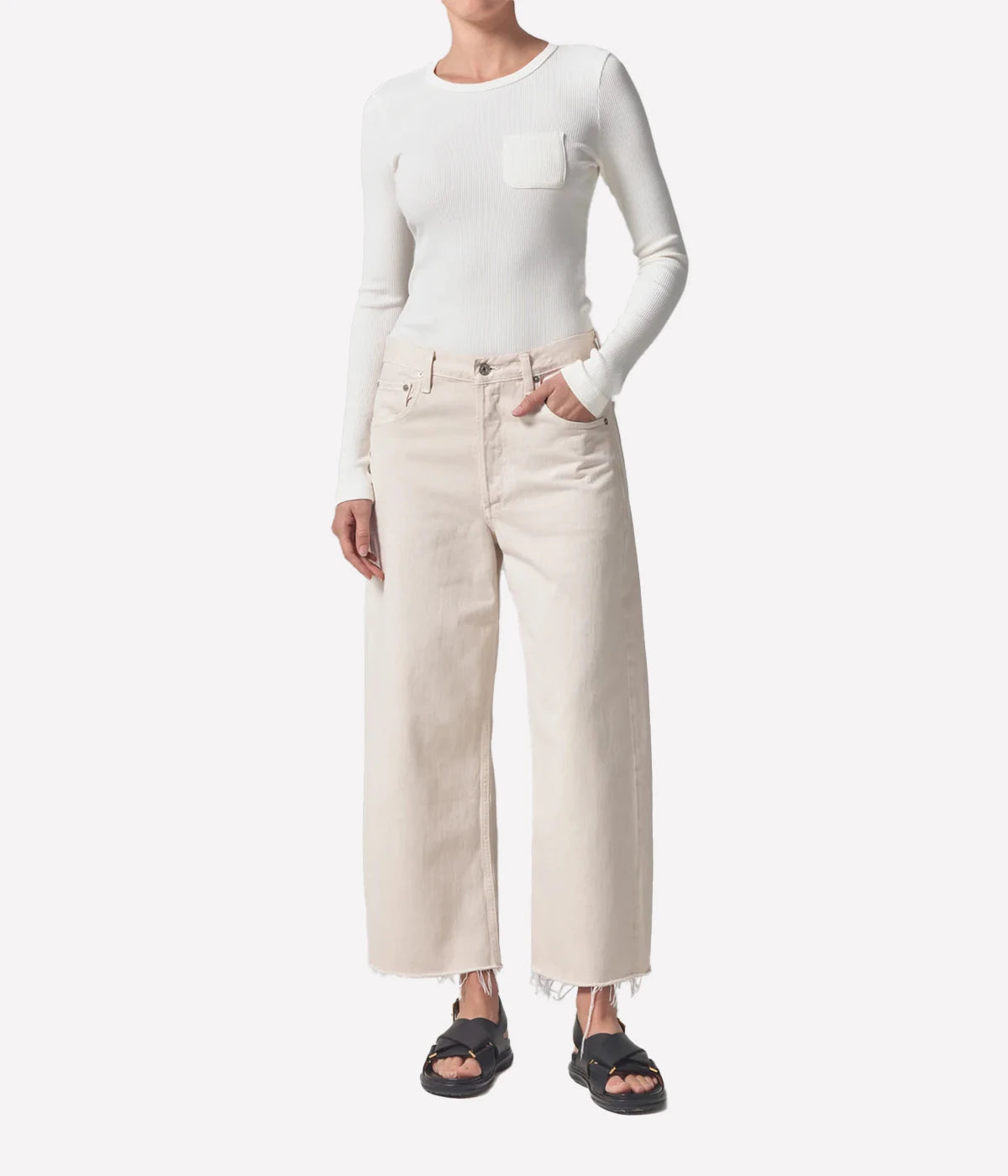 Ayla Raw Hem Jean in Almondette by Citizen of Humanity, featuring a relaxed vintage-inspired fit with a raw hem finish and a soft, neutral hue for versatile styling.