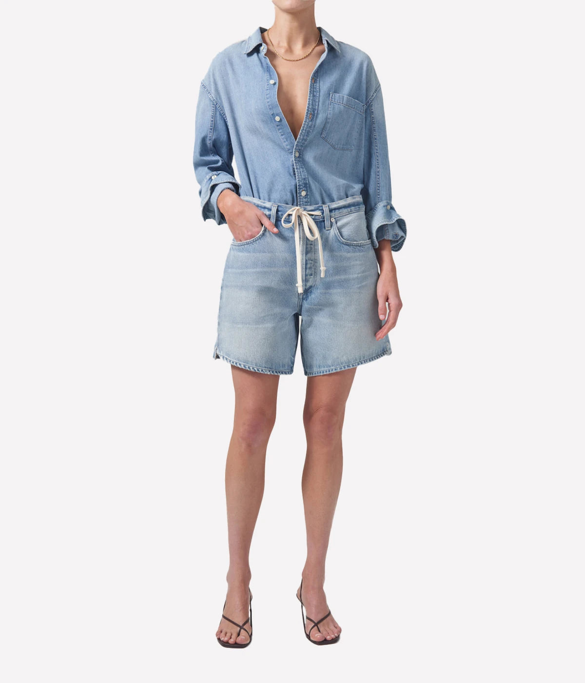 ALT Text: Brynn Short in light vintage indigo, featuring a relaxed fit, drawstring waistband, and finished hems, crafted from 100% regenerative cotton for a soft, breathable feel.