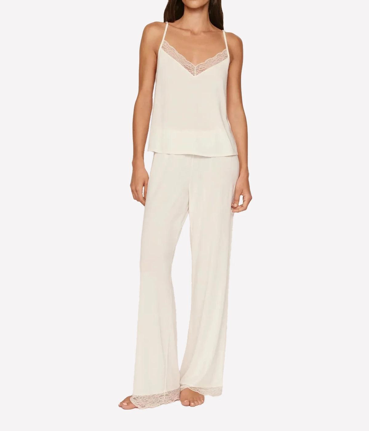 Model wearing the Eberjey Kari Cami & Pant Pj Set in Ivory, full-length front view showing the lace-trimmed V-neck cami with fine straps and straight leg pants
