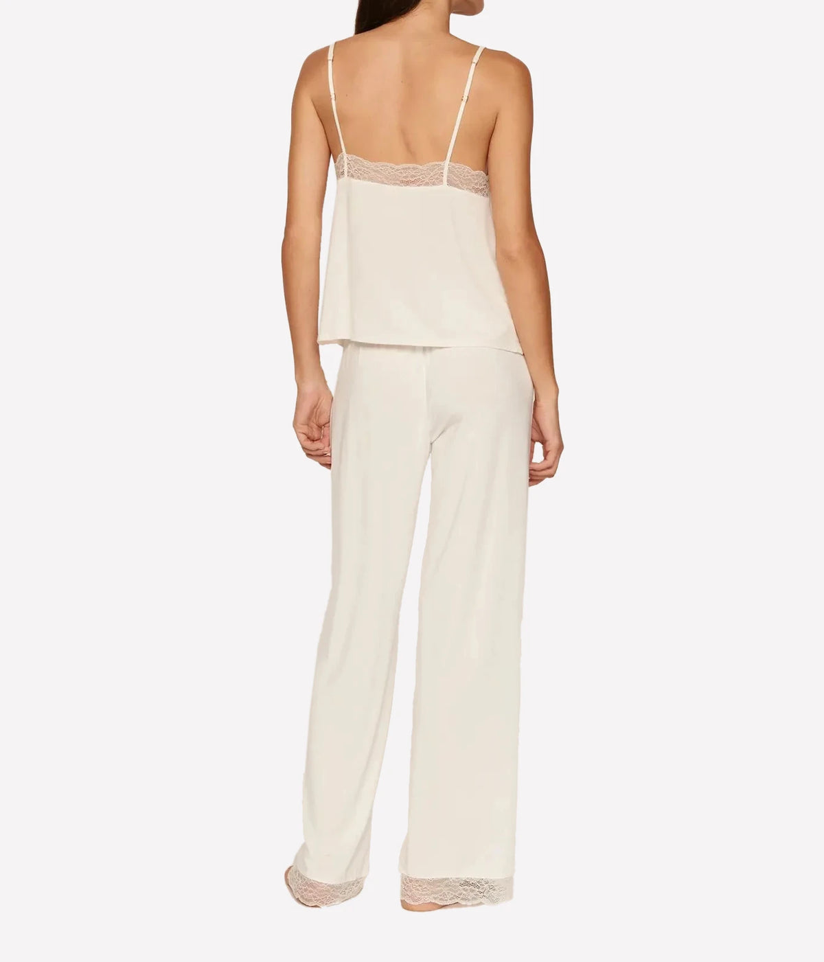 Back view of a model wearing the Eberjey Kari Cami & Pant Pj Set in Ivory, showing the fine cami straps and full-length straight leg pants