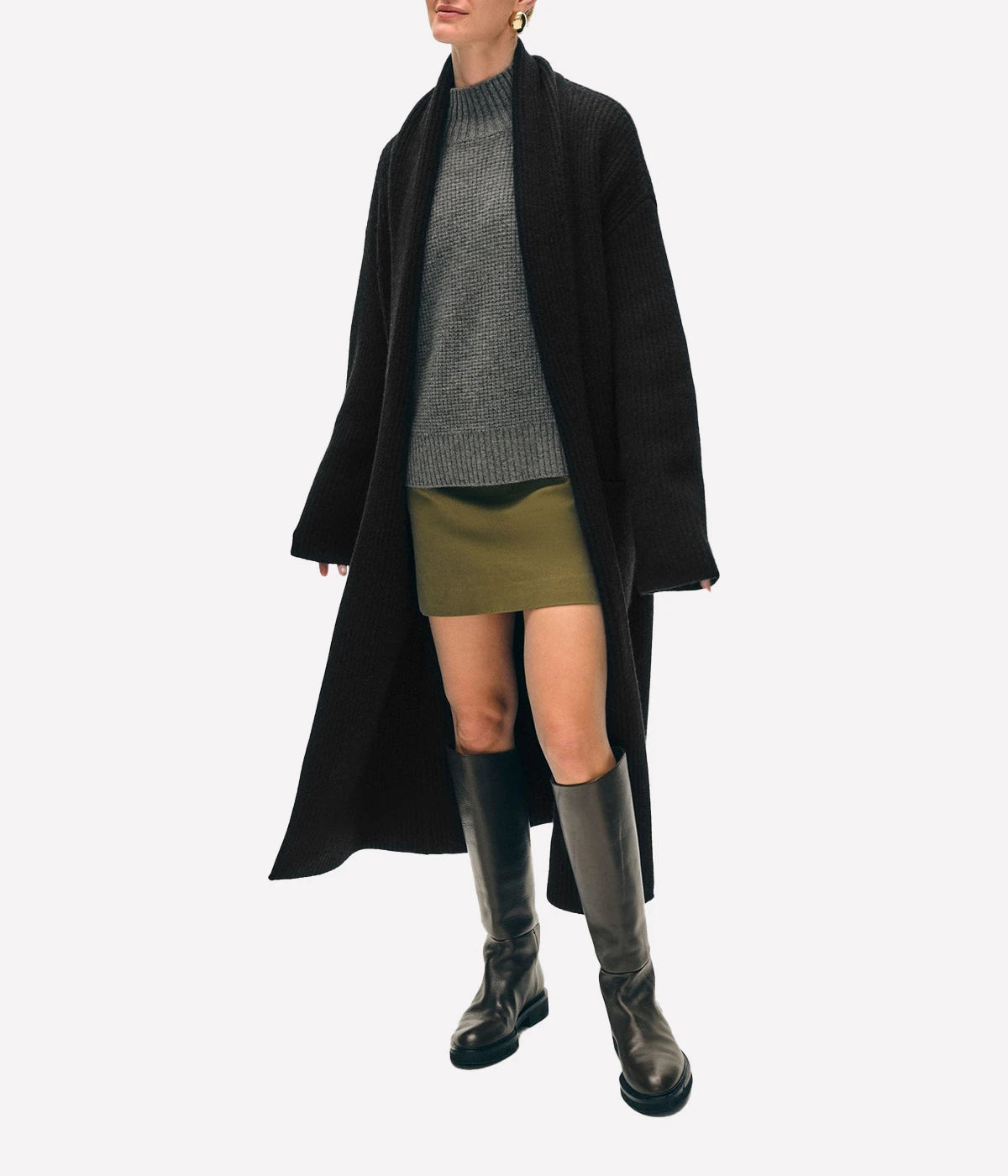 ALT text: White + Warren longline ribbed cashmere blend cardigan in black, styled over a tonal outfit for a relaxed tailored look.