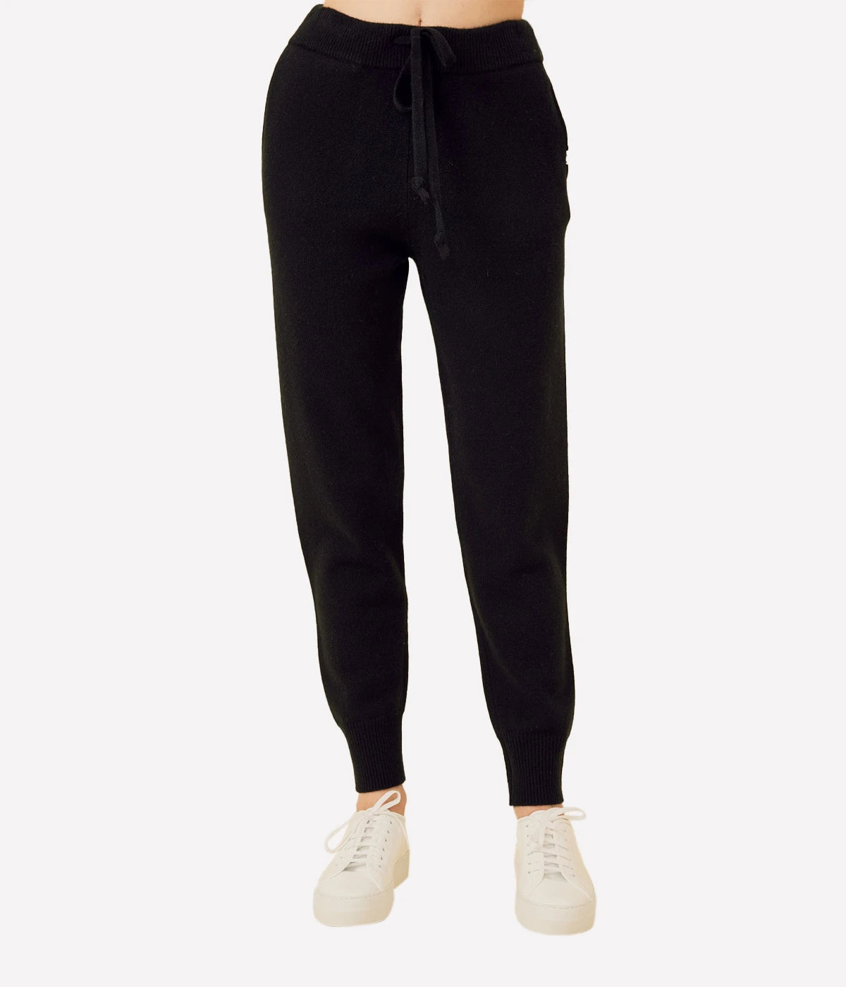 ALT Text: Colorado Cashmere Pant in Black, featuring a mid-gauge weight, adjustable drawstring waist, and functional pockets with branded whip-stitching for a luxurious yet practical design.
