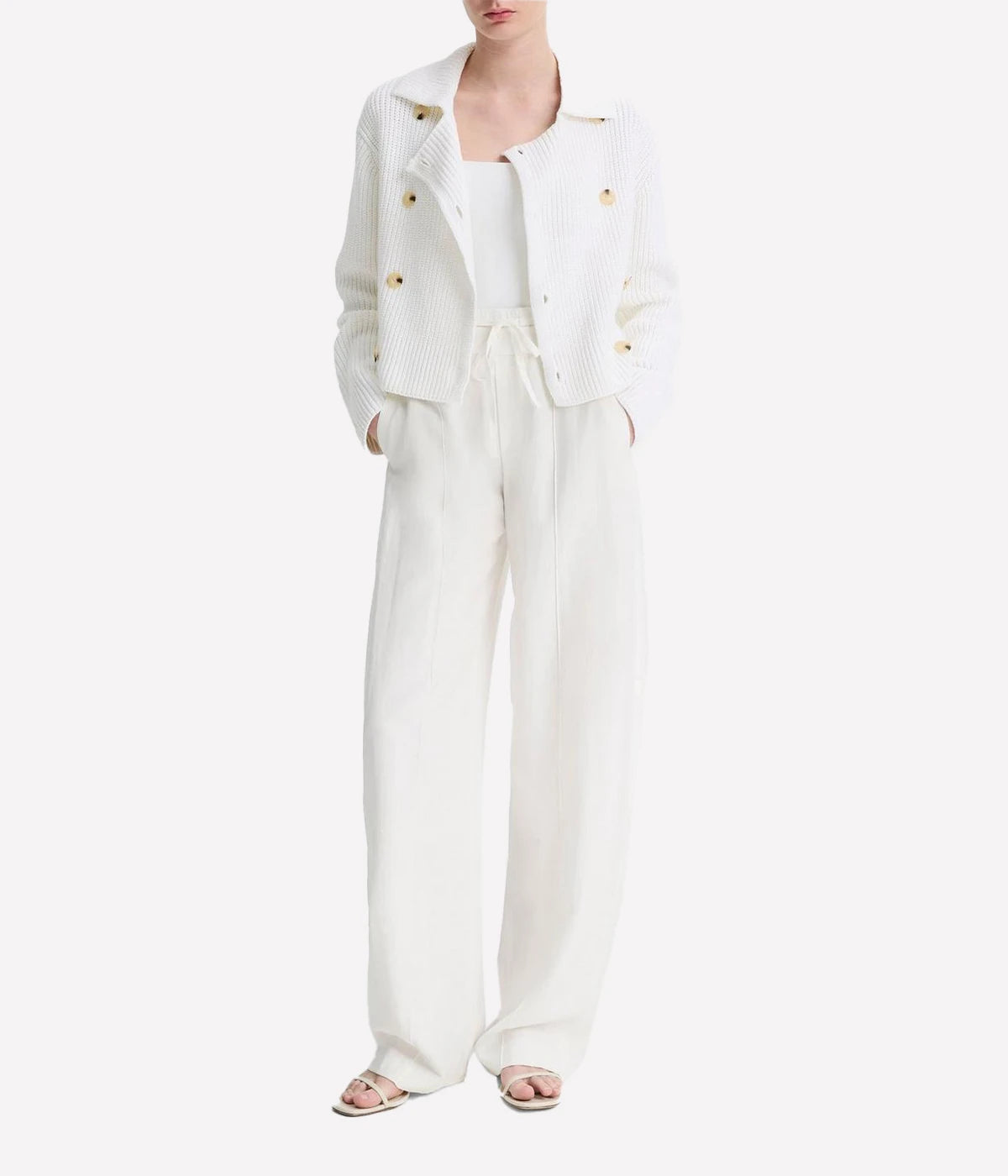 Women's double-breasted shaker-stitch cotton sweater in navy with faux-horn buttons and cropped silhouette – structured knit layering piece