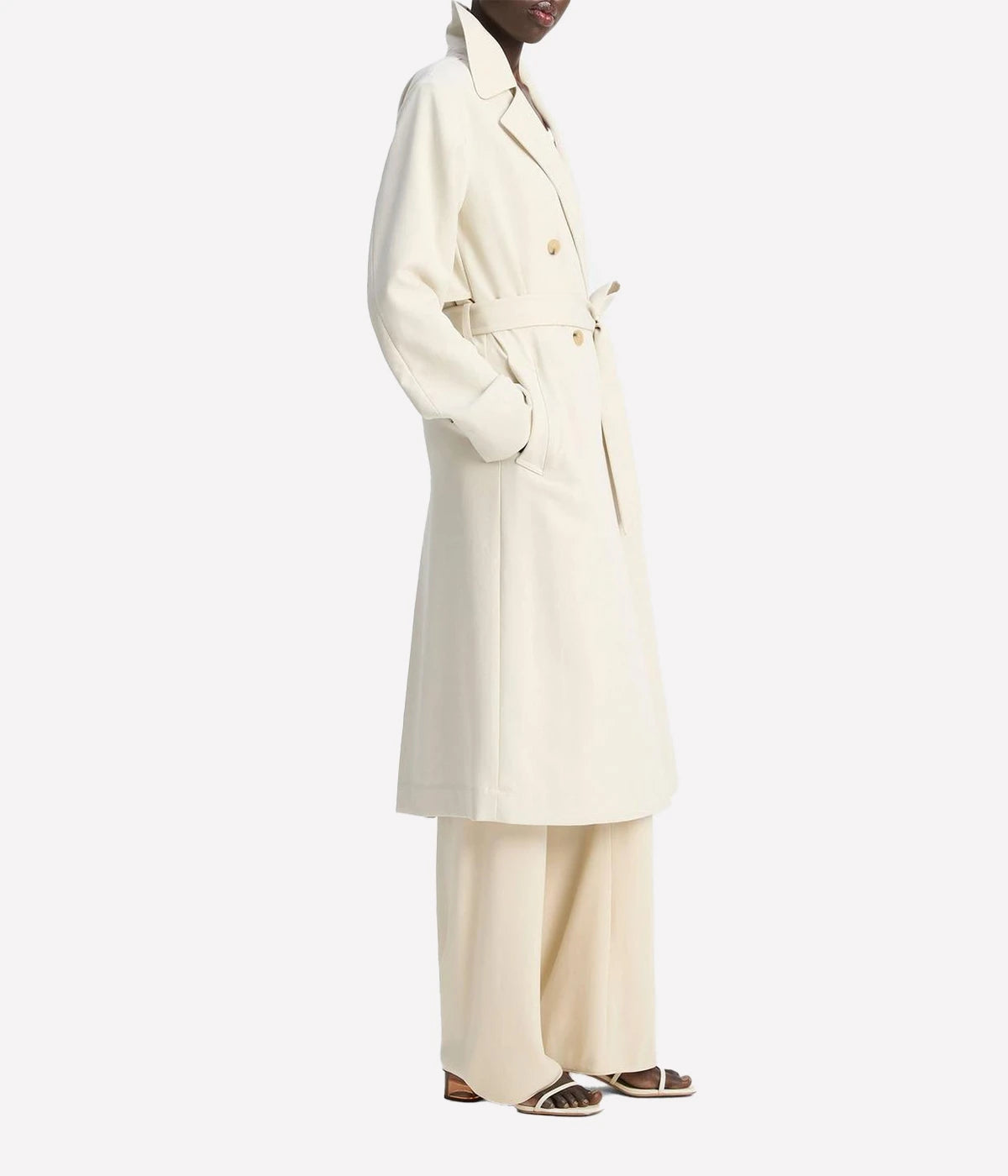 Vince lightweight women's trench coat in beige with classic button-front, self-tie belt, storm flap, and adjustable cuffs – breathable viscose-blend outerwear