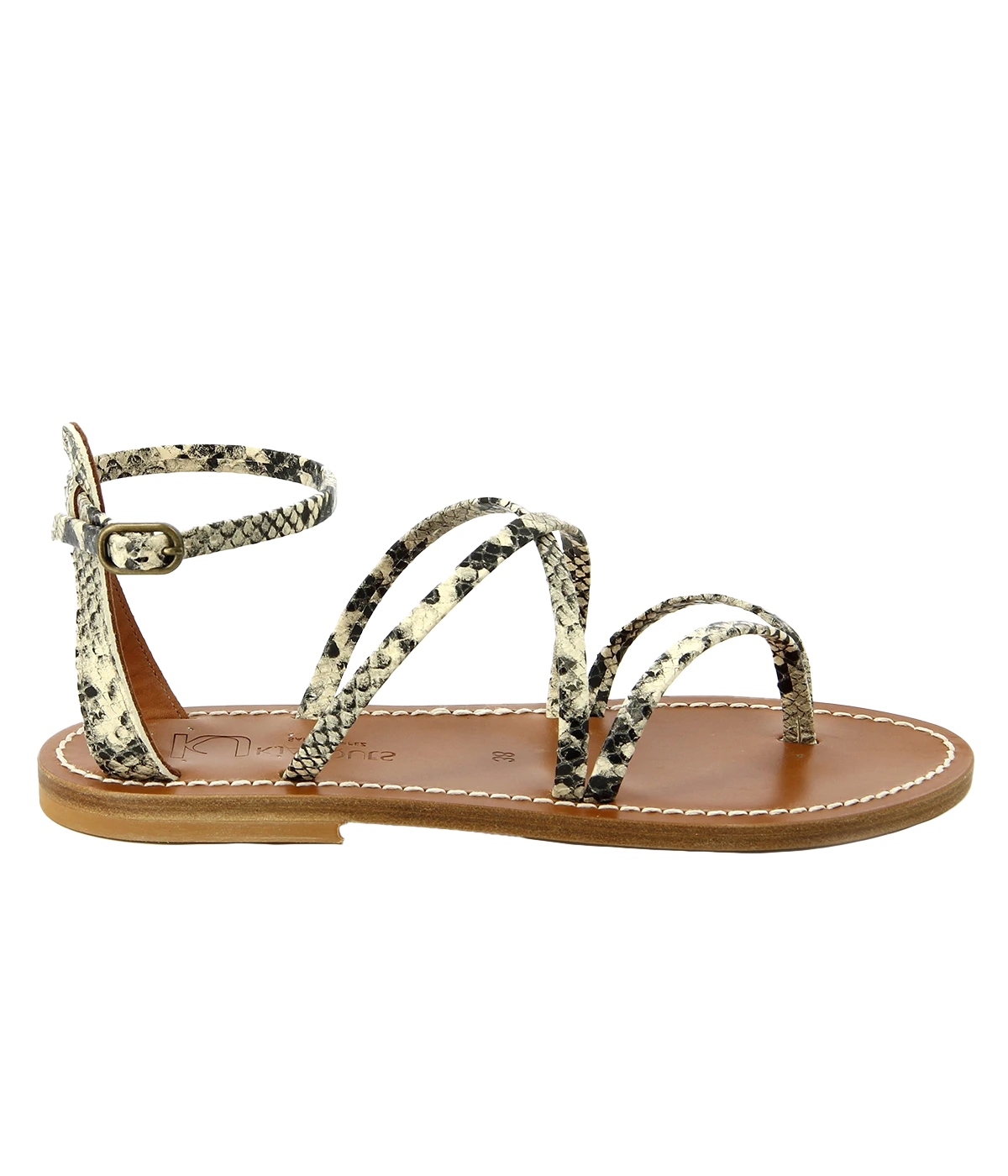 Epicure flat sandals by K. Jacques featuring snake print crossed straps and a handcrafted leather design, styled for effortless summer looks.
