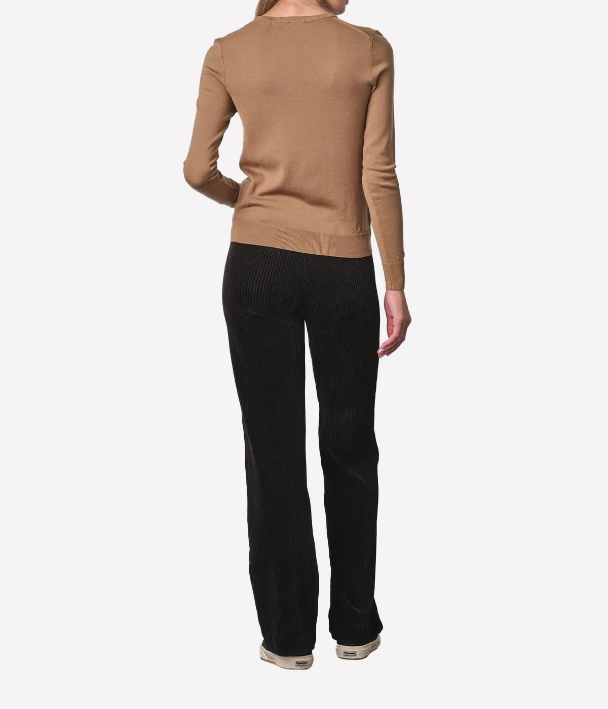 Full-length flare pants with a slimming fit through the thighs and a subtle flare at the hem. Made from a soft fabric blend of cotton, modal, polyester, and cord, these pants provide a stylish and flattering silhouette, ideal for both casual and formal wear