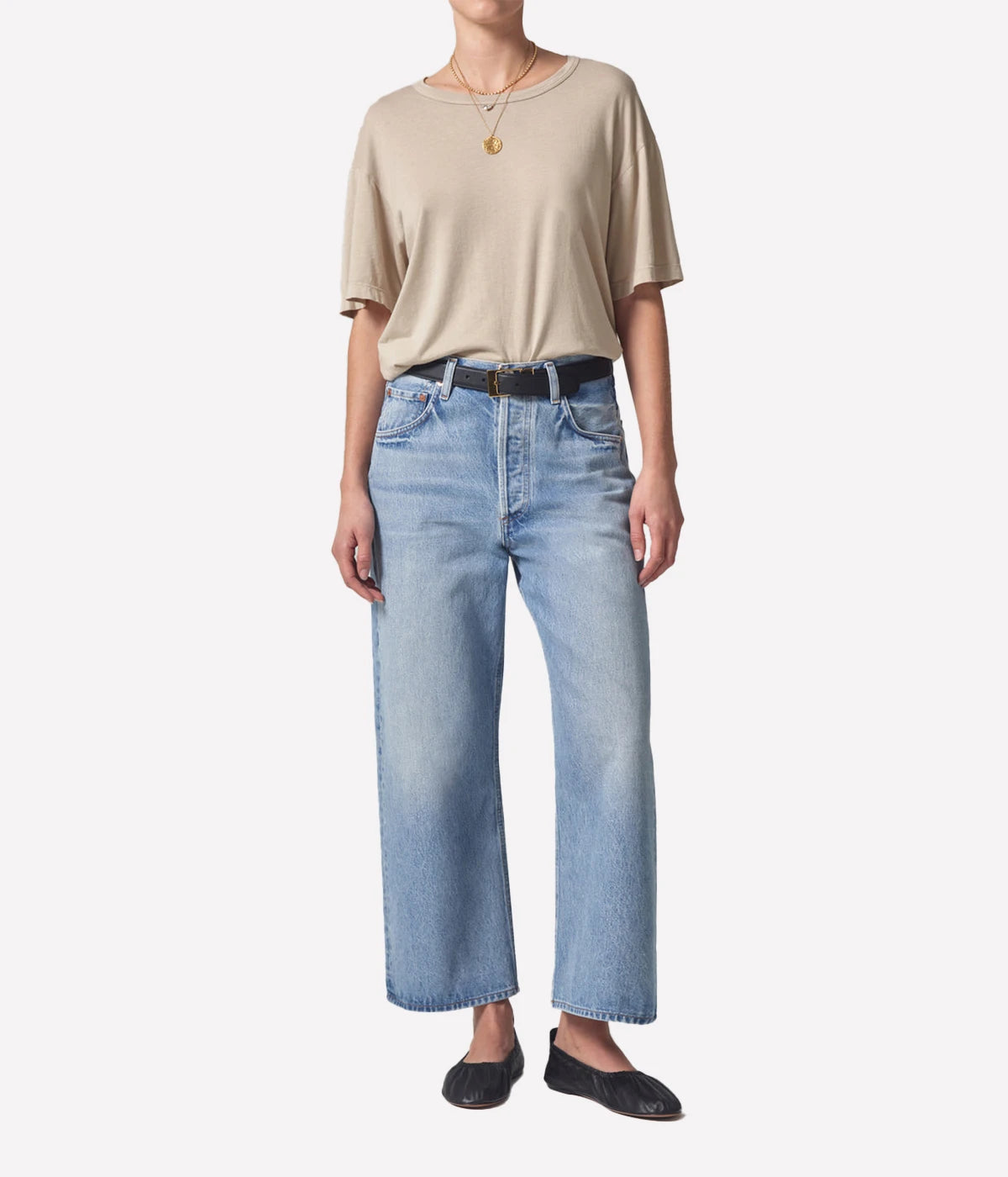 ALT Text: Vintage-inspired wide-leg jeans with a cropped hem and high-waisted fit, crafted from regenerative cotton.