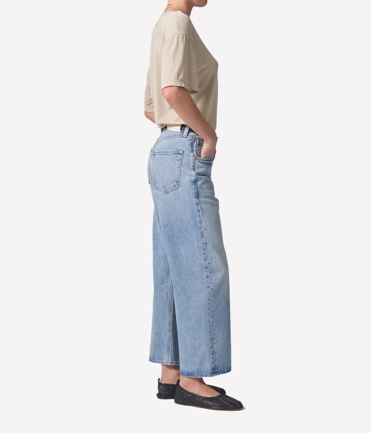 ALT Text: Vintage-inspired wide-leg jeans with a cropped hem and high-waisted fit, crafted from regenerative cotton.