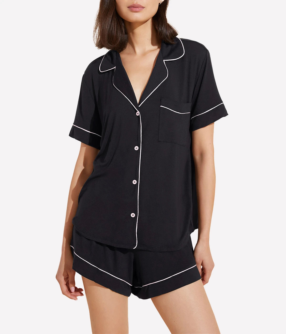 ALT Text: Relaxed button-down top and boyfriend-fit shorts set with tortoise-colored buttons and contrast piping for casual sophistication.Ideal Stretch: The fabric offers just the right amount of stretch, allowing for freedom of movement while maintaining a flattering silhouette.
Classic Cut: Enjoy full coverage with our classic cut design, providing both comfort and confidence, whether you’re lounging at home or dressing for a night out.
Timeless Solid Colors: The vibrant