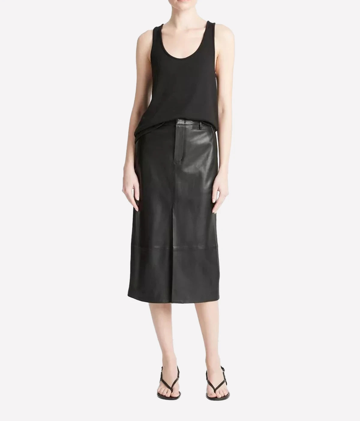 Trouser inspired straight black leather midi skirt with pockets and belt loops.