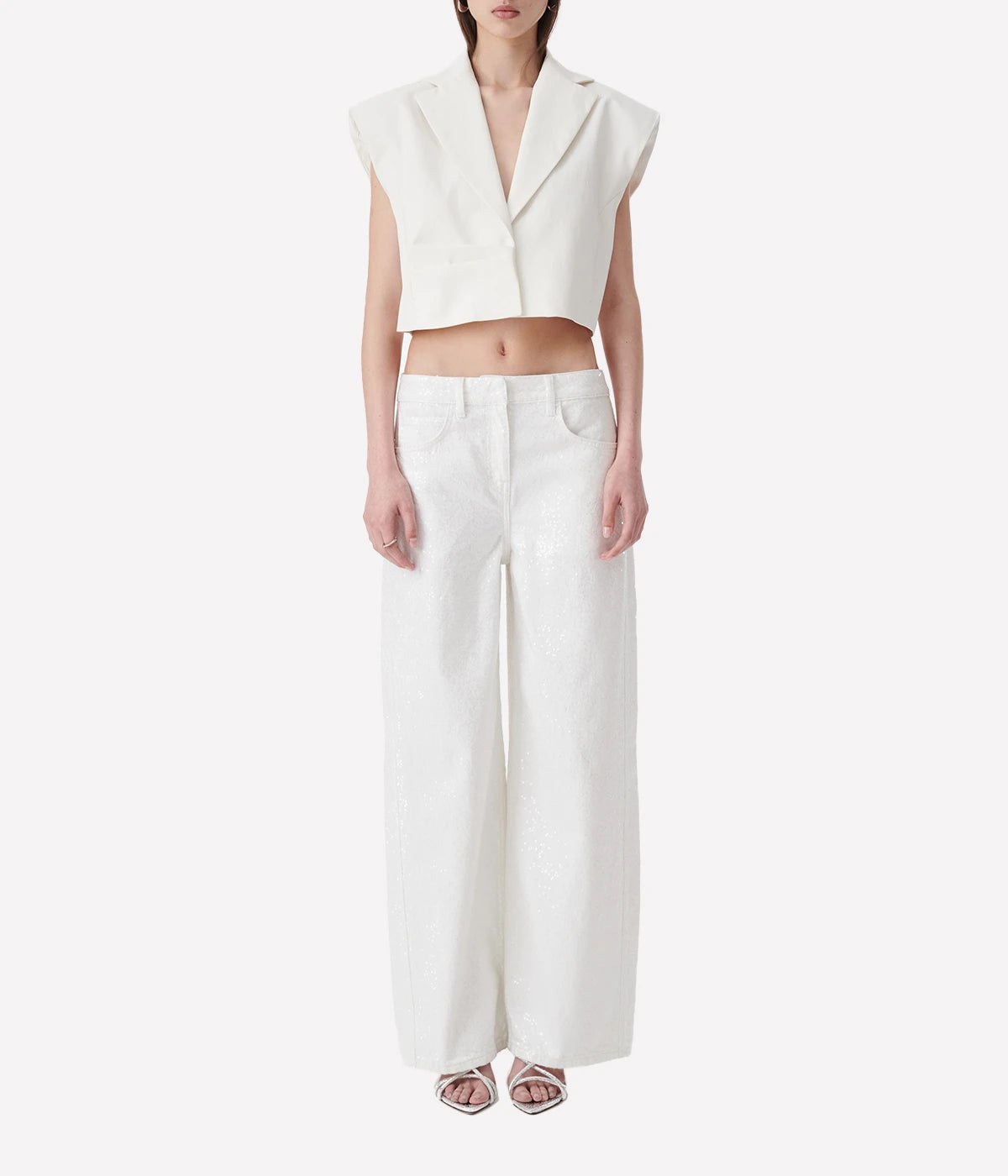 Mana Sequin Jean in White by IRO, made from 100% organic cotton, featuring all-over sequin detailing, a five-pocket design, and a slim fit in a crisp white color.