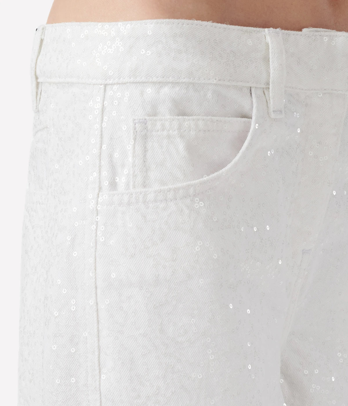 Mana Sequin Jean in White by IRO, made from 100% organic cotton, featuring all-over sequin detailing, a five-pocket design, and a slim fit in a crisp white color.
