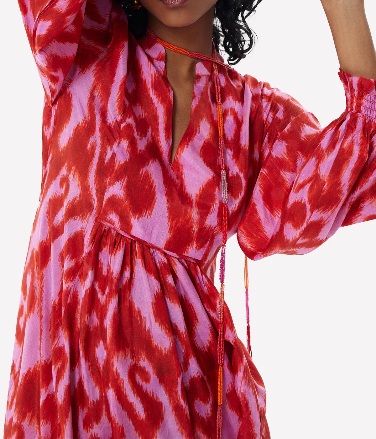 ALT Text: Fuchsia maxi dress in flowing silk fabric with a relaxed fit and vibrant colour, perfect for special occasions or elevated everyday wear.