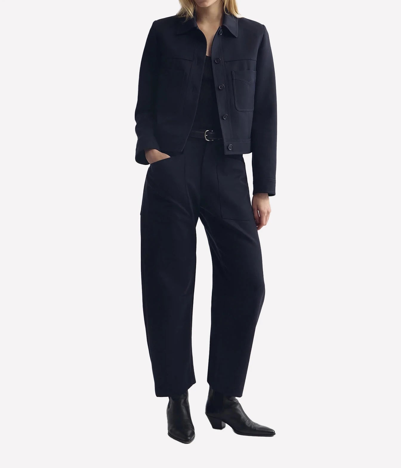 Model wearing Nili Lotan Shon Wool Pant in Midnight with matching cropped jacket, full-length front view