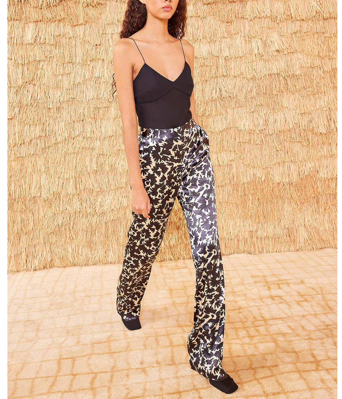 With its mid-rise waist and fluid straight leg, this classic style offers a sleek silhouette perfect for any occasion. Finished with slant pockets and a concealed hook, button, and zipper fly, the Ollie Pant combines elegance and versatility.