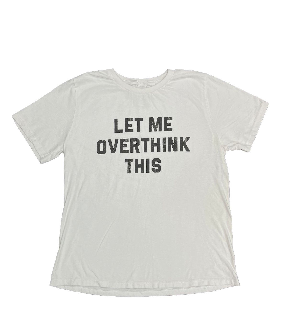 ALT text: White cotton tee with “Let Me Overthink This” print in black, short sleeves, and classic crew neck laid flat on a neutral surface.