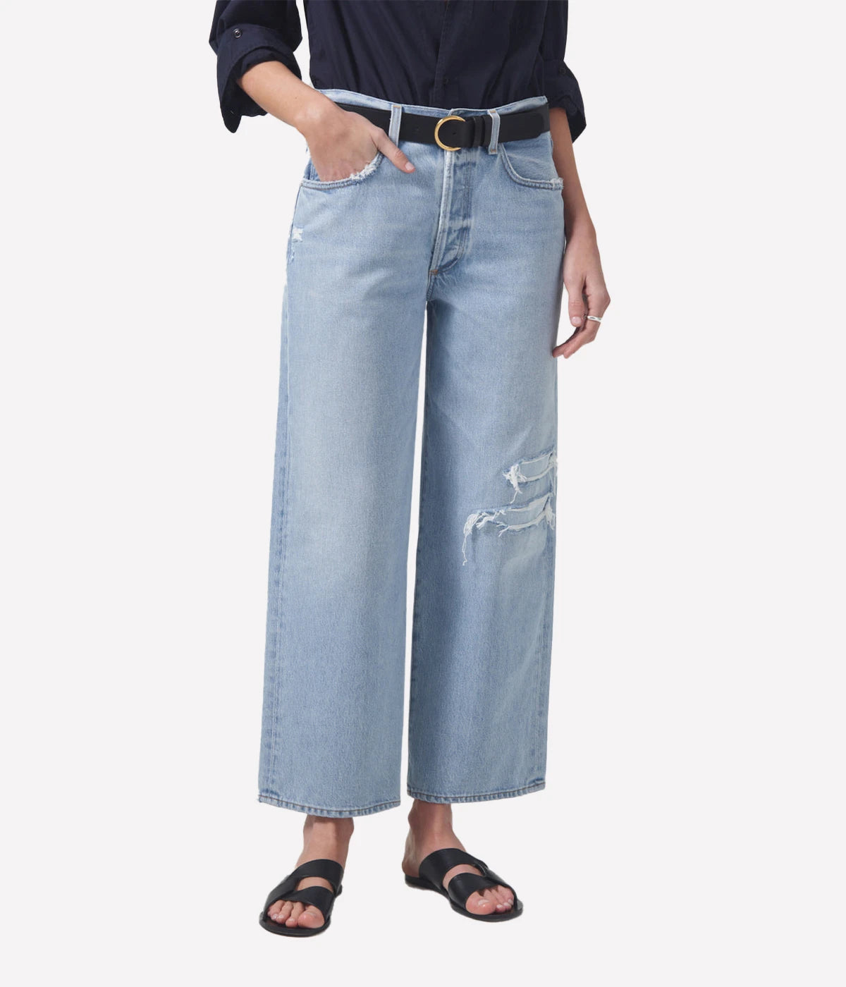 Low-rise, vintage-inspired jeans with a relaxed fit, button fly, and wide-leg silhouette in sustainable regenerative cotton.