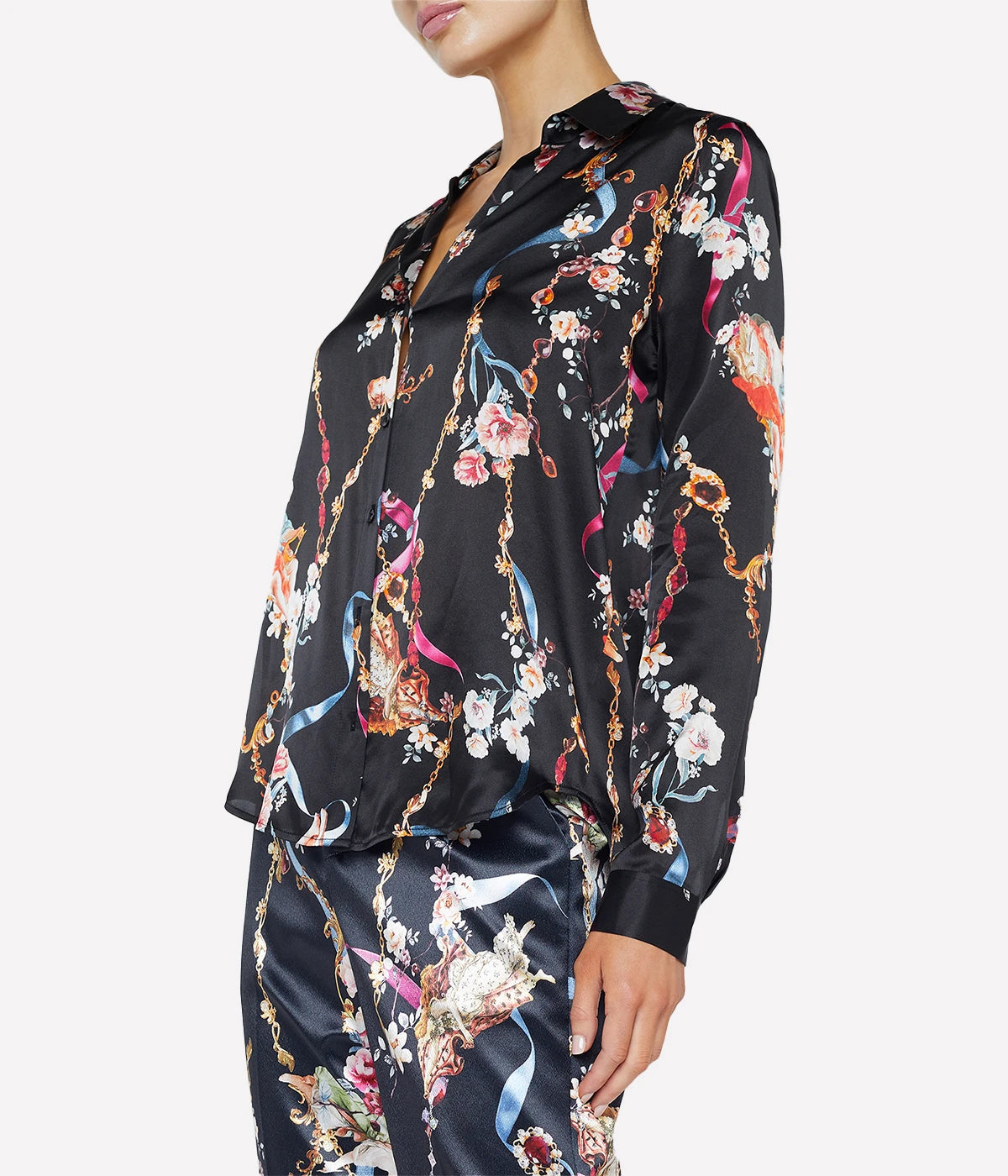 ALT text: Silk blouse with black and multi-toned rococo print and long sleeves