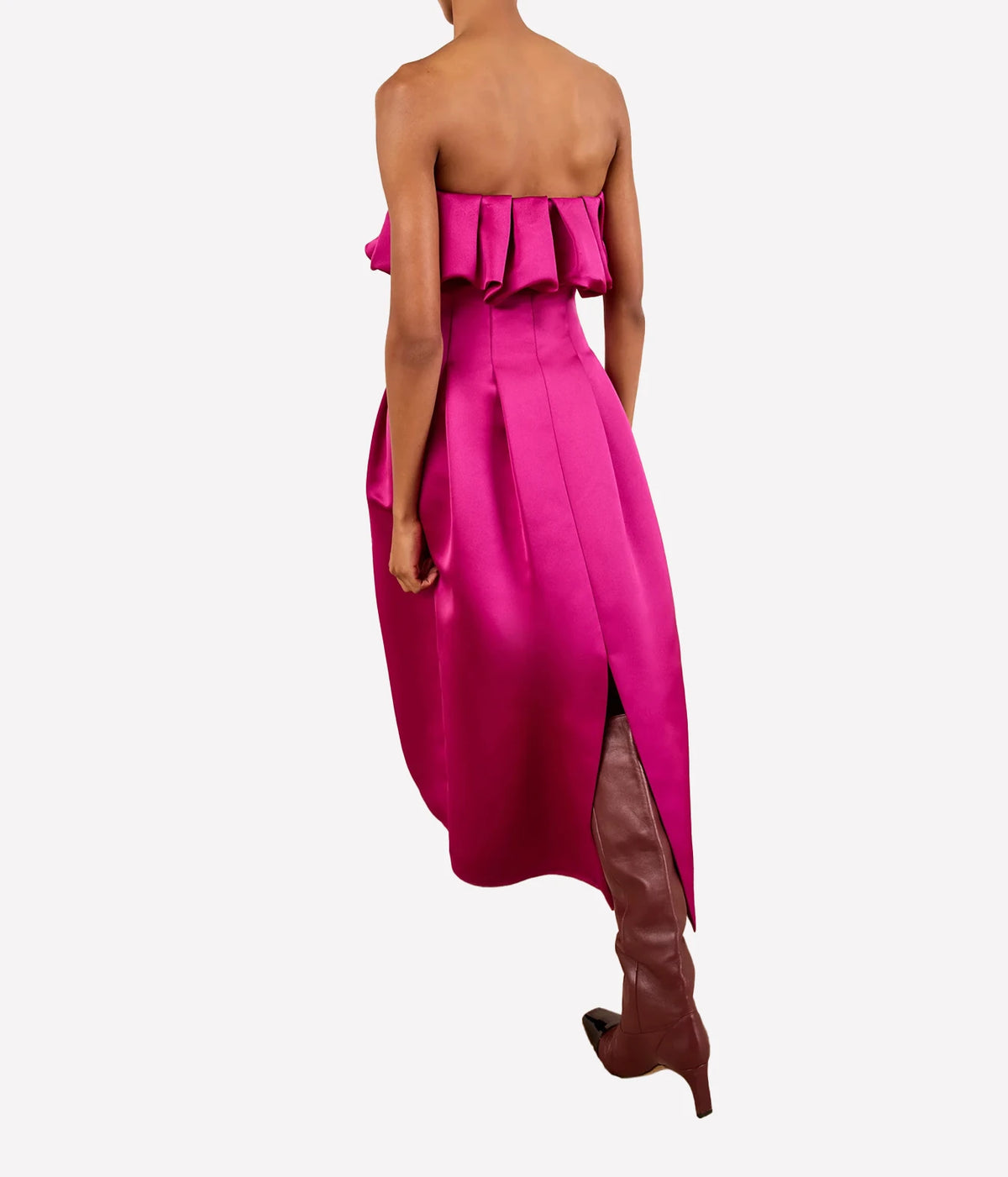 Model wearing Ulla Johnson Cosima Strapless Satin Dress in Orchid, back view