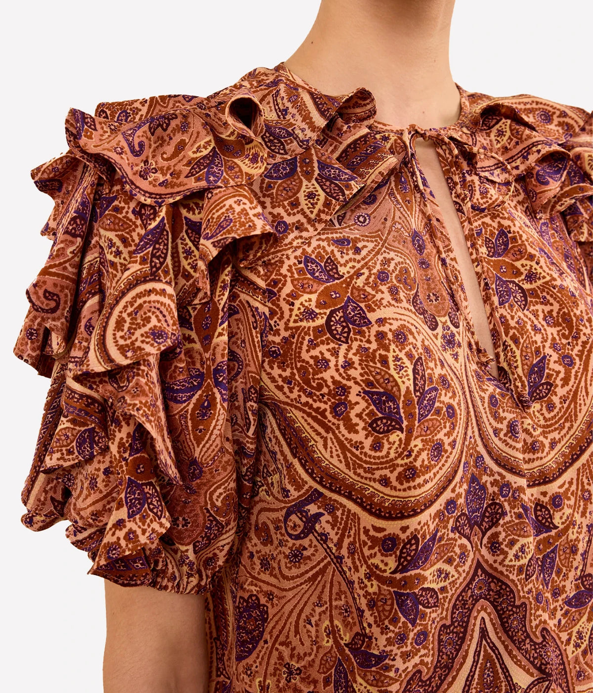 Close-up of Ulla Johnson Josephine Short Sleeve Silk Top in Rosette paisley print and ruffle detailing