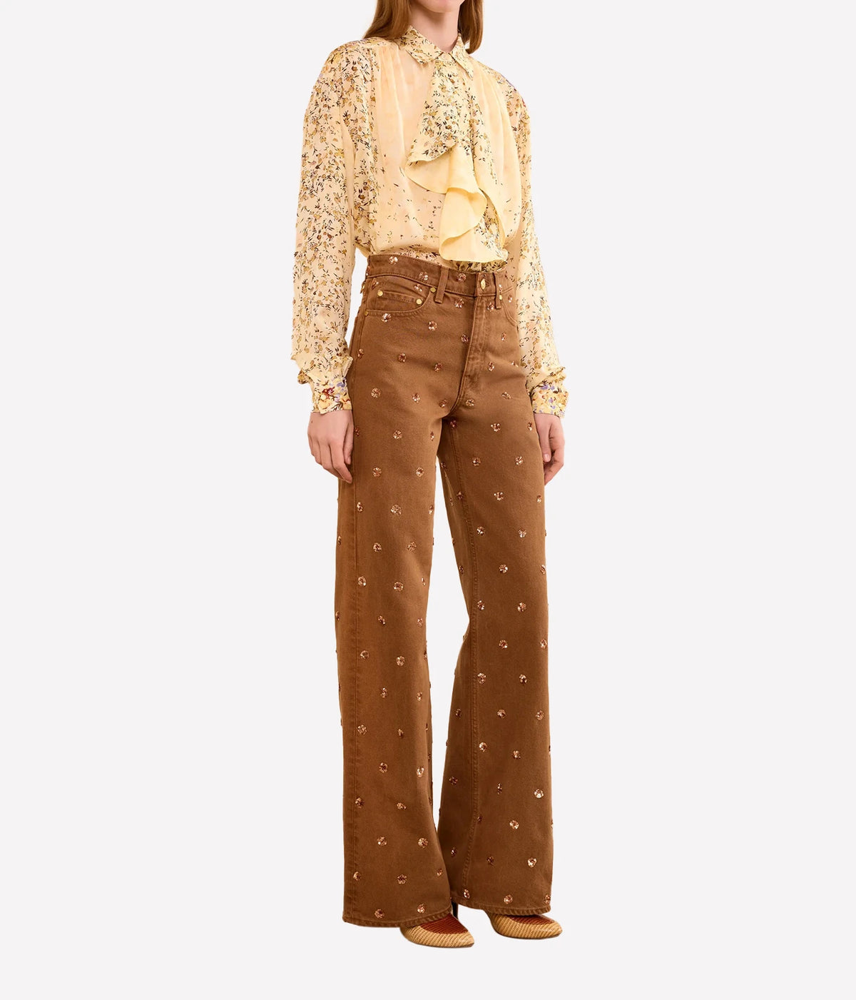 Model wearing Ulla Johnson The Willow Embellished Wide Leg Jean in Umber styled with a printed blouse